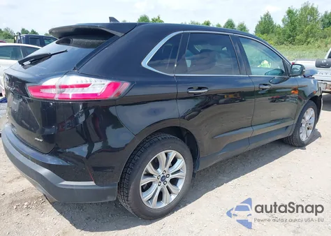 2022 Ford Edge Titanium z USA, uszkodzony, nr VIN 2FMPK4K94NBB05850